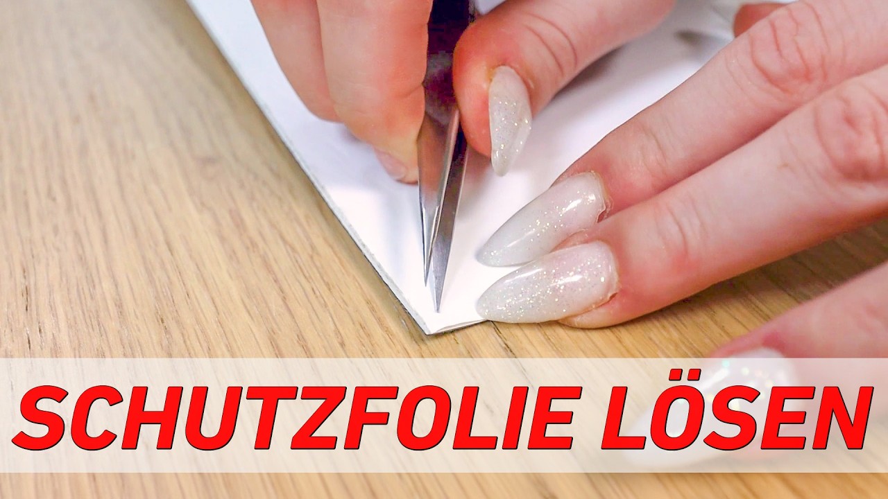 K&uuml;chenr&uuml;ckwand Schutzfolie mit Pinzette l&ouml;sen